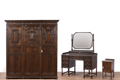 Lot 121 - Sopwith & Co: an carved oak four-piece bedroom suite; and similar bedframe