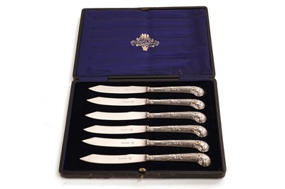 Lot 269 - A set of Edwardian silver pistol-handled knives