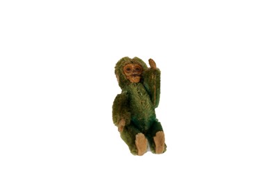 Lot 704 - An early 20th Century Schuco monkey scent bottle