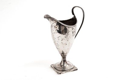 Lot 312 - A Georgian silver cream jug by Charles Chesterman II