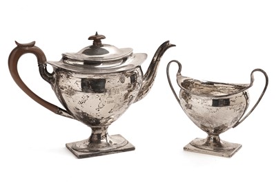 Lot 311 - An Edwardian silver two-piece tea service