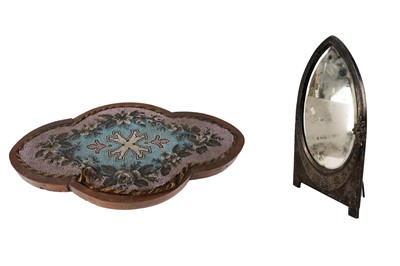 Lot 214 - An Arts and Crafts style silver plated easel mirror; and a 19th Century beaded stand