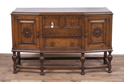 Lot 107 - An early 20th Century Lees style carved oak sideboard