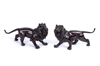 Lot 905 - A pair of Japanese bronze lion figures