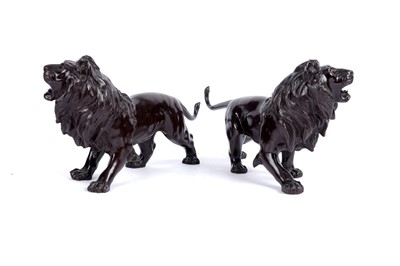 Lot 905 - A pair of Japanese bronze lion figures