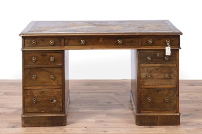 Lot 103 - A Victorian walnut pedestal desk