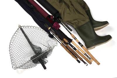 Lot 1875 - A collection of fishing rods; a pair of waders; and a landing net