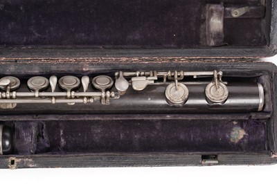 Lot 11 - Two Rudall Carte & Co flutes; and a piccolo
