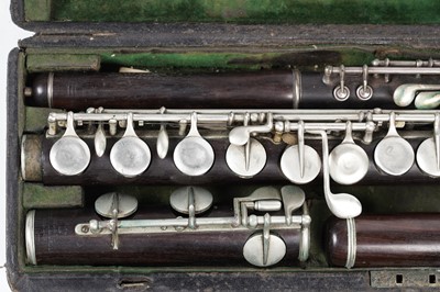 Lot 11 - Two Rudall Carte & Co flutes; and a piccolo