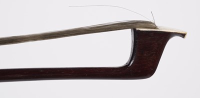 Lot 62 - A Pernambuco violin bow, cased