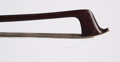 Lot 62 - A Pernambuco violin bow, cased
