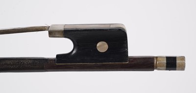 Lot 62 - A Pernambuco violin bow, cased
