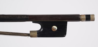 Lot 62 - A Pernambuco violin bow, cased