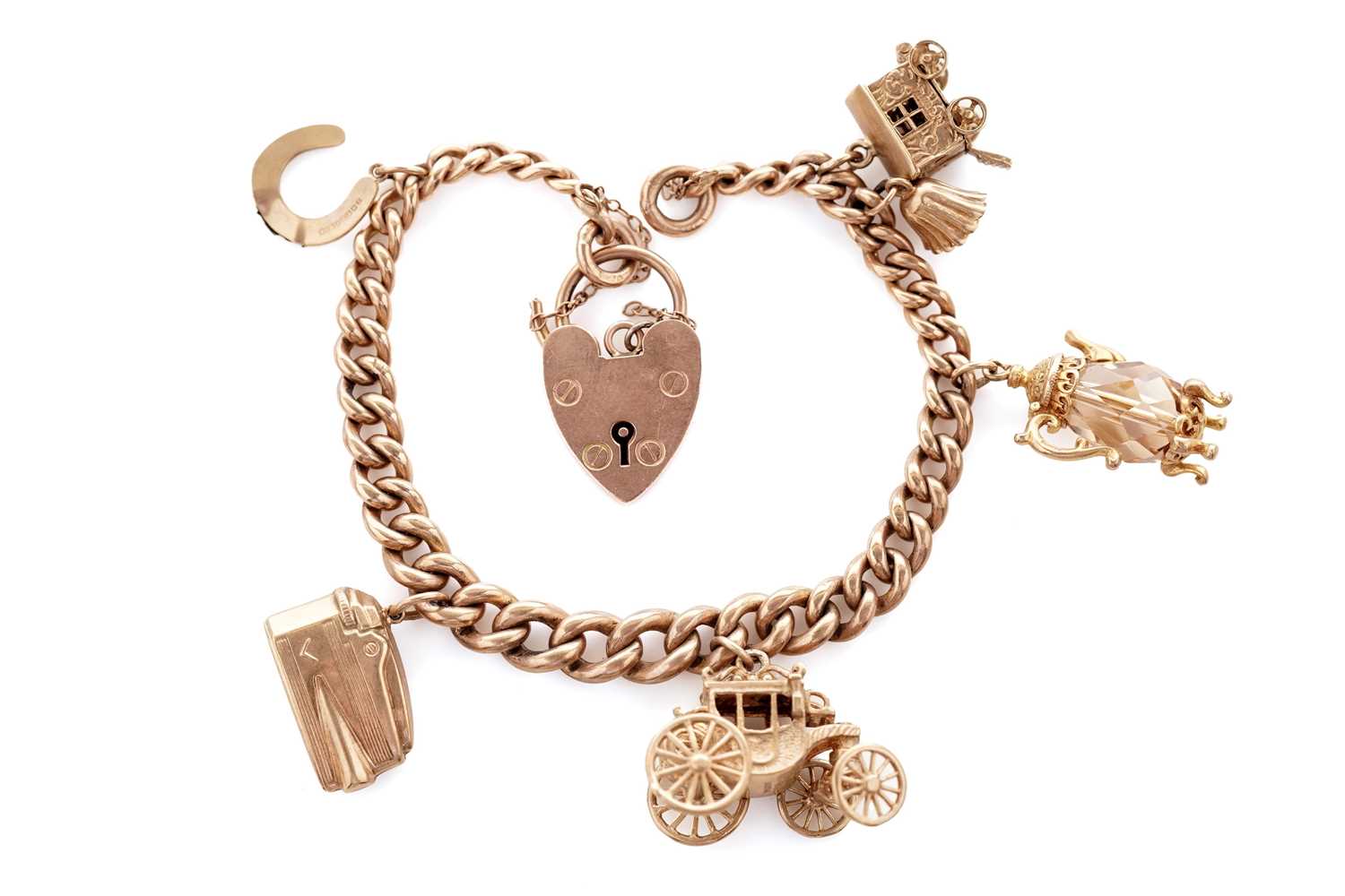 Lot 5 - A 9ct rose gold charm bracelet