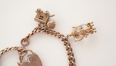 Lot 5 - A 9ct rose gold charm bracelet