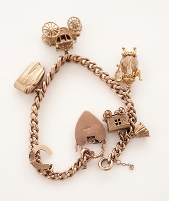 Lot 5 - A 9ct rose gold charm bracelet