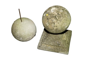 Lot 474A - ﻿A pair of spherical composite stone garden ornaments