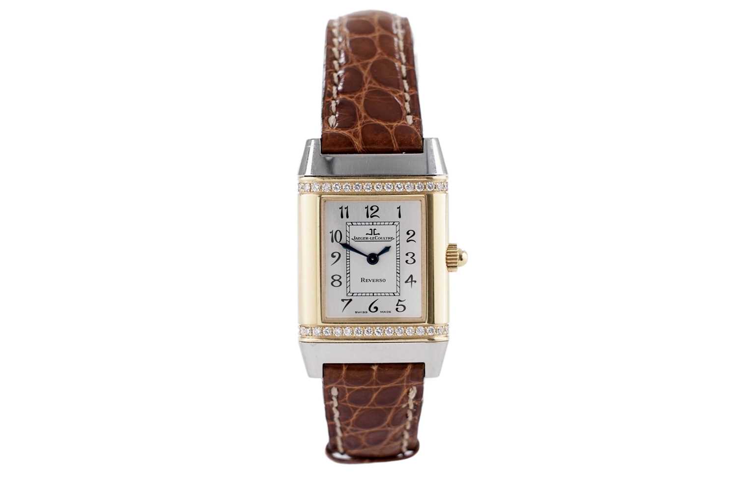 Lot 544 - Jaeger-LeCoultre, Reverso: a lady's stainless steel and 18ct yellow gold diamond-set wristwatch