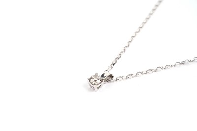 Lot 728 - A solitaire diamond pendant necklace