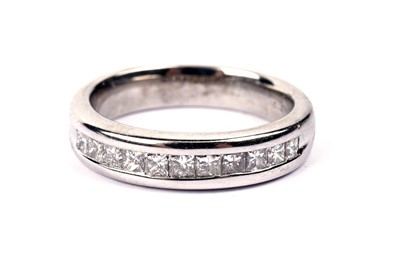 Lot 730 - A diamond half eternity ring