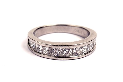 Lot 731 - A diamond half hoop eternity ring