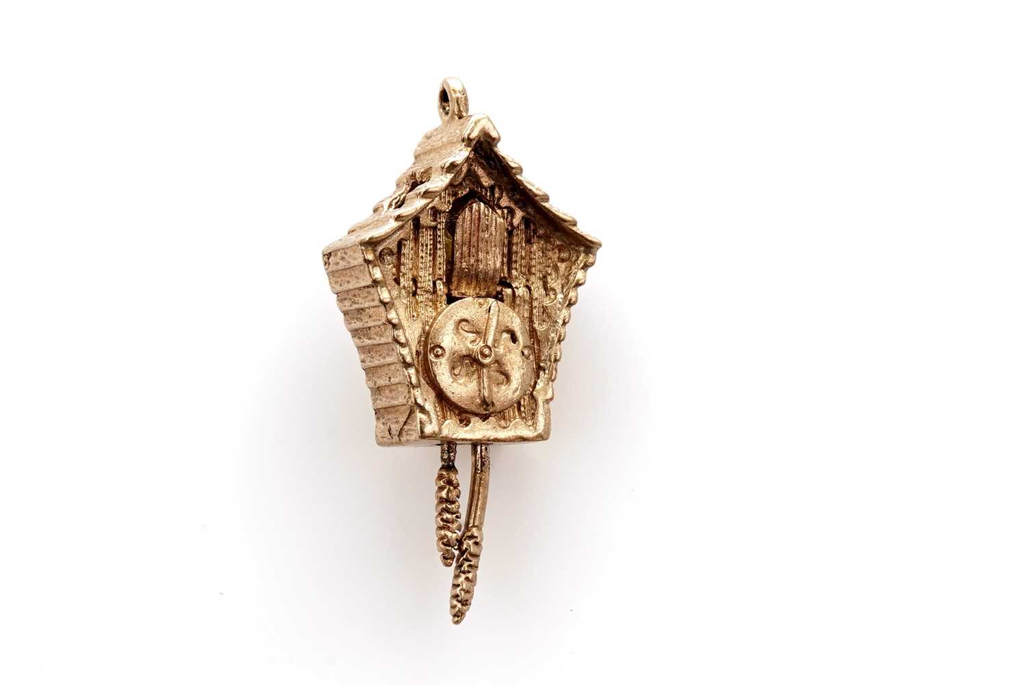 Lot 16 - A 9ct yellow gold cuckoo clock pendant