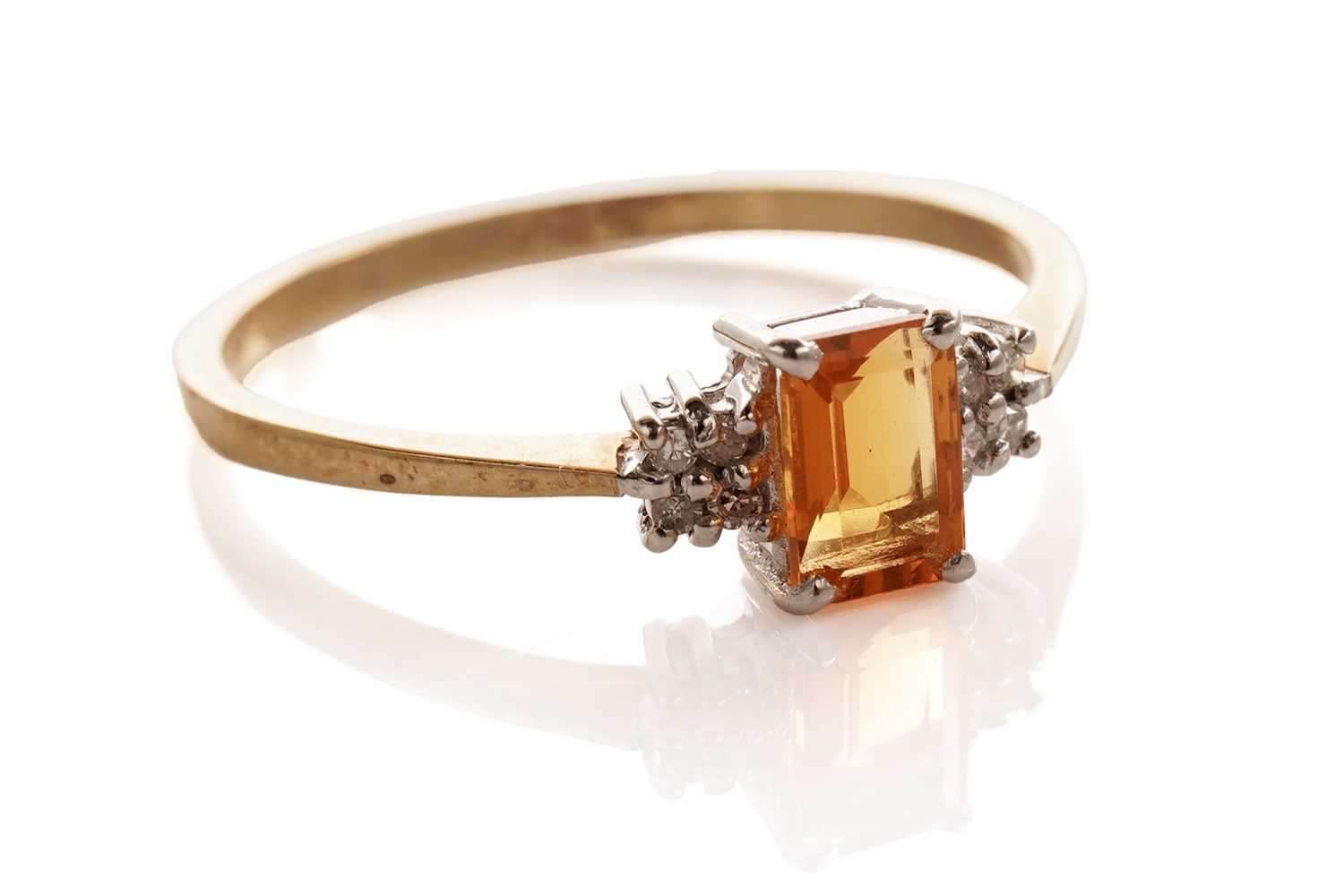 Lot 145 - A fire opal and diamond ring