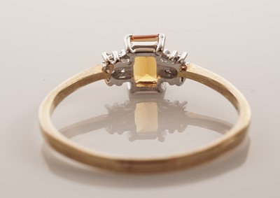 Lot 145 - A fire opal and diamond ring