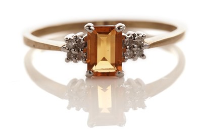 Lot 145 - A fire opal and diamond ring