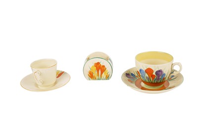 Lot 872 - A Clarice Cliff ‘Spring Crocus’ pattern coffee cup and saucer and sugar bowl; and other items