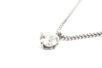 Lot 736 - A single stone solitaire diamond pendant