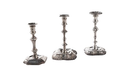 Lot 145 - A late Victorian silver taperstick; and two other tapersticks