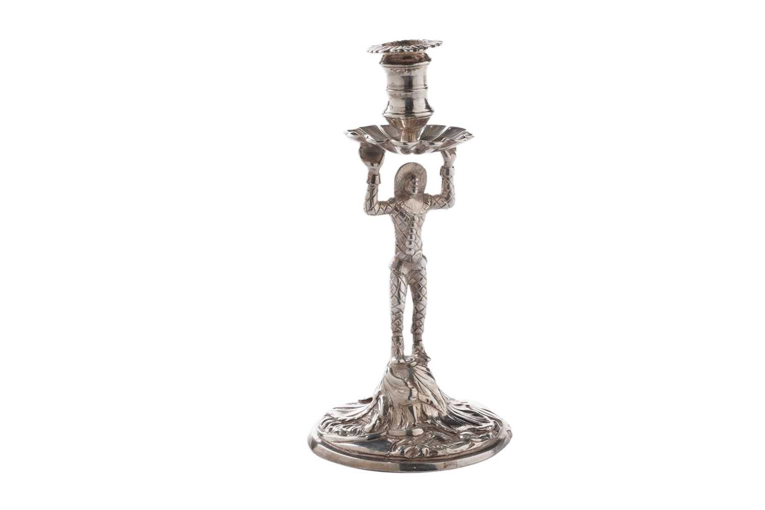 Lot 149 - A George III cast silver taperstick