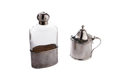 Lot 155 - A Victorian silver mounted glass spirit flask; and a silver mustard pot