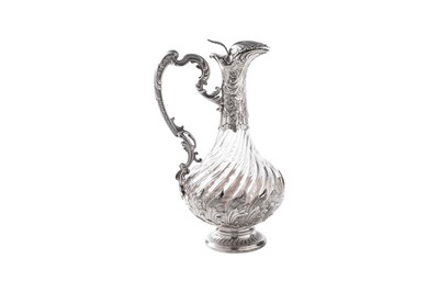 Lot 58 - A late 19th century French silver mounted clear glass claret jug