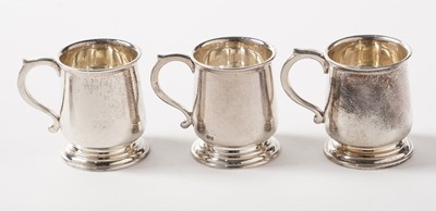 Lot 160 - A George V cased set of six silver tot cups in the form of miniature mugs