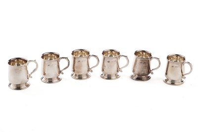 Lot 19 - A set of six George V silver tot cups