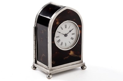 Lot 20 - A George V silver mounted tortoiseshell desk timepiece