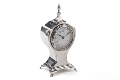 Lot 162 - An Edwardian silver mounted desk timepiece