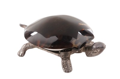 Lot 395 - A novelty tortoise shell mounted plated table/reception bell