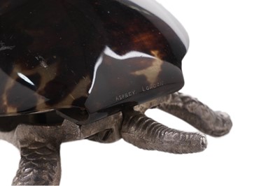 Lot 395 - A novelty tortoise shell mounted plated table/reception bell