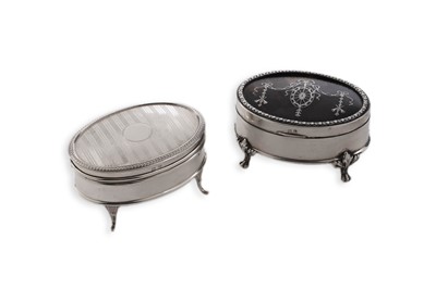 Lot 402 - An Edwardian silver mounted and inlaid tortoiseshell jewel box; and another silver example