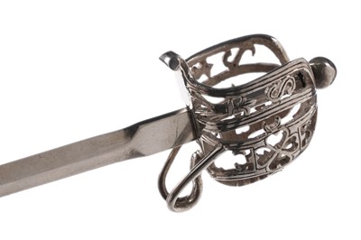 Lot 368 - A late Victorian Scottish silver letter opener in the form of a miniature basket hilted sword