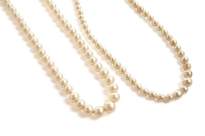 Lot 225 - A cultured freshwater pearl necklace with gold clasp; and another