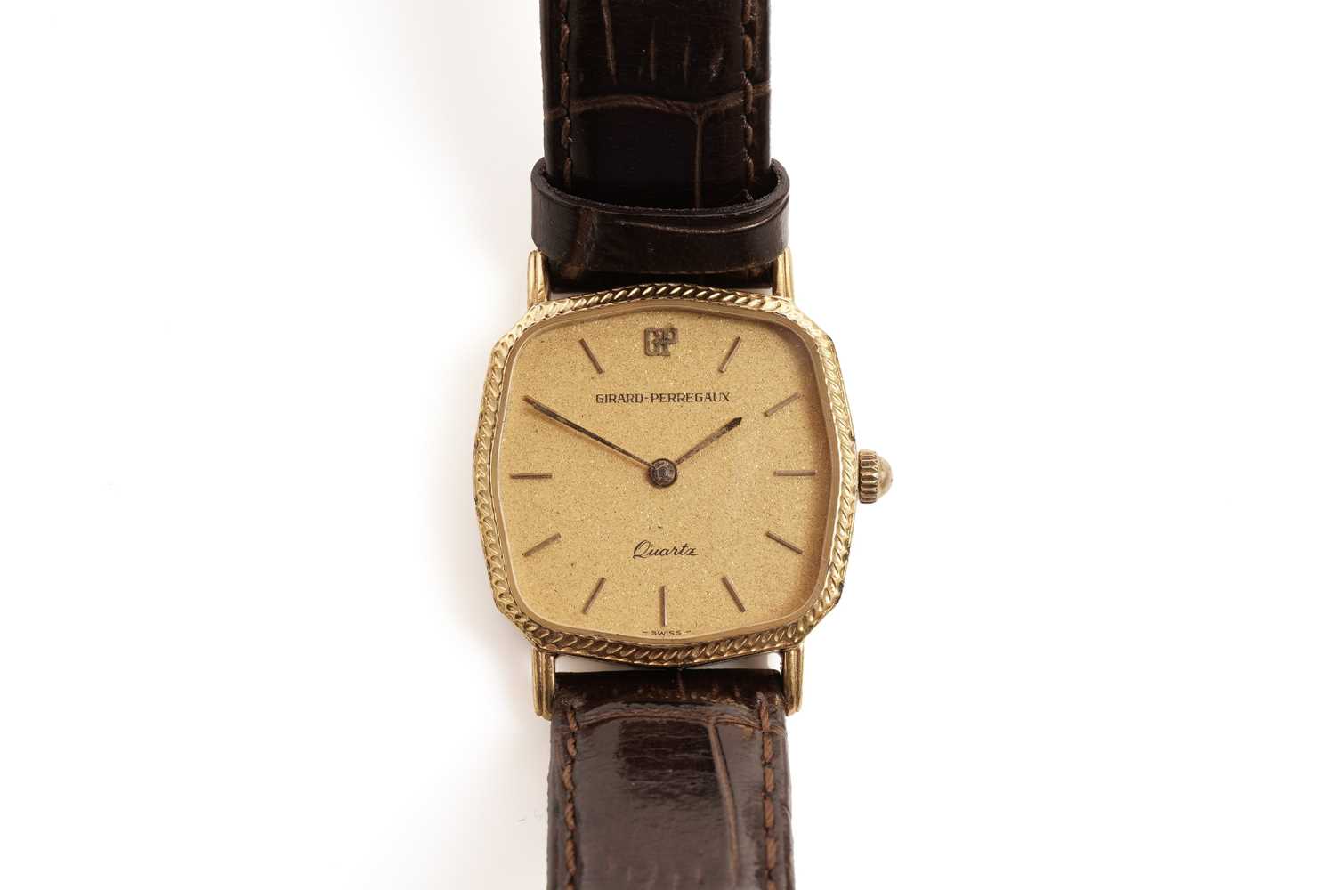 Lot 233 - A Girard Perregaux gilt metal cased quartz wristwatch