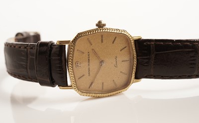 Lot 233 - A Girard Perregaux gilt metal cased quartz wristwatch