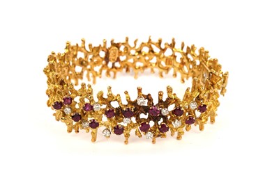 Lot 739 - George Weil: ruby and diamond 18ct yellow gold bangle