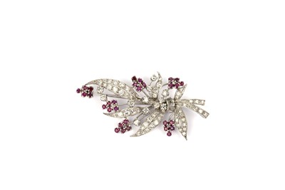 Lot 742 - A ruby and diamond floral brooch