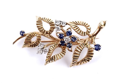 Lot 743 - A sapphire and diamond floral pattern brooch