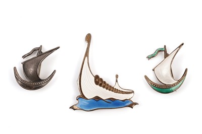 Lot 238 - Two Norwegian silver enamel ship brooches; and another